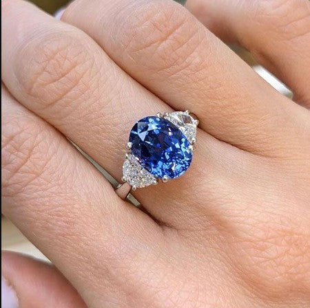 Three-Stone Oval Cut Blue Sapphire Engagement Ring