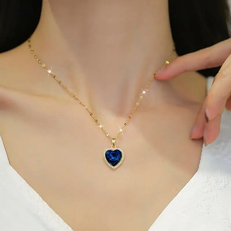 Gold sapphire heart necklace