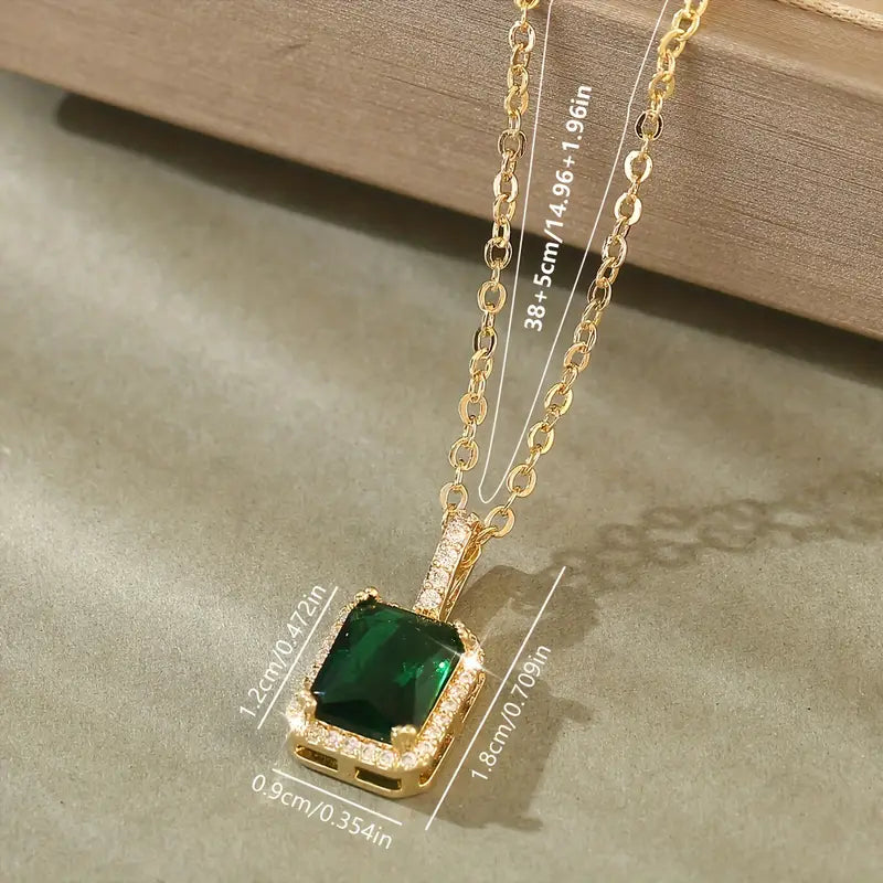 Gold emerald rectangular halo necklace