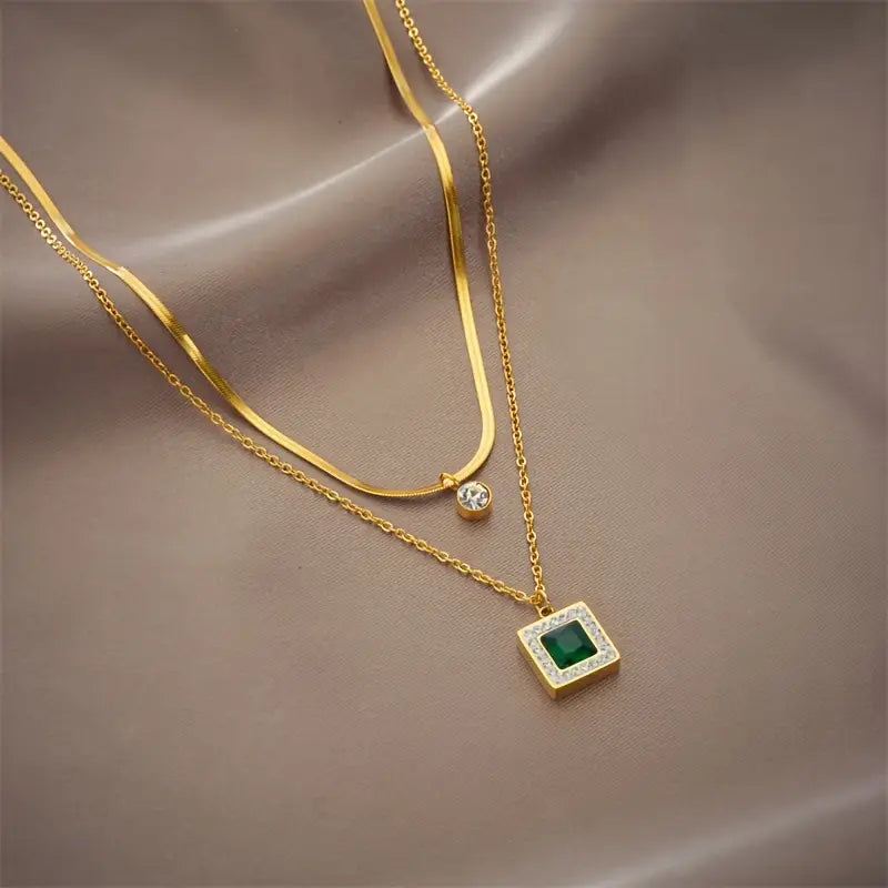 Gold emerald layered necklace