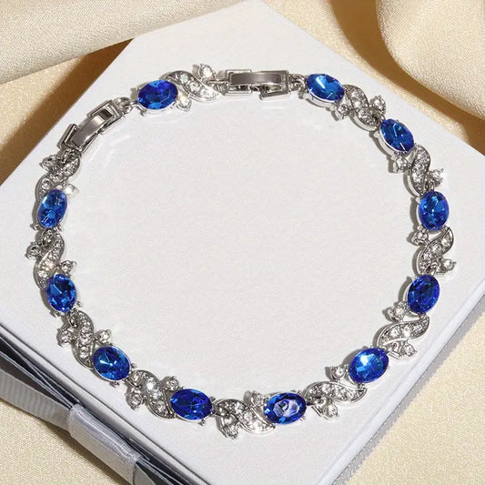 Silver sapphire floral link bracelet