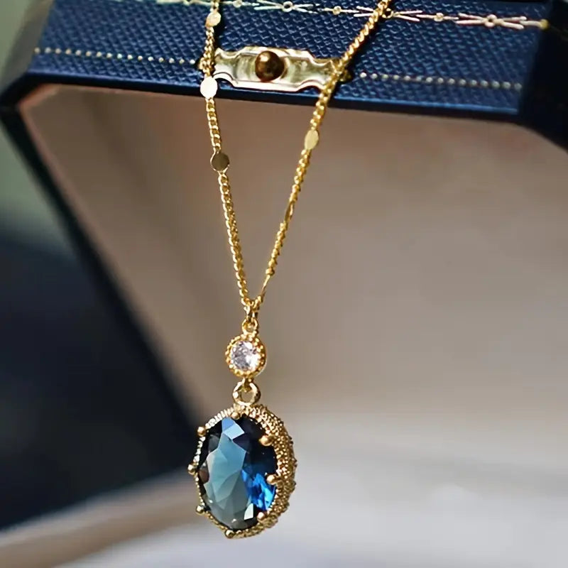 Gold sapphire oval drop necklace