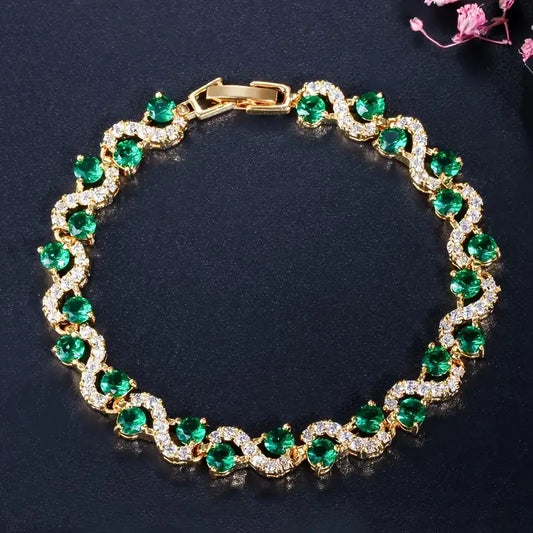 Gold emerald halo bracelet