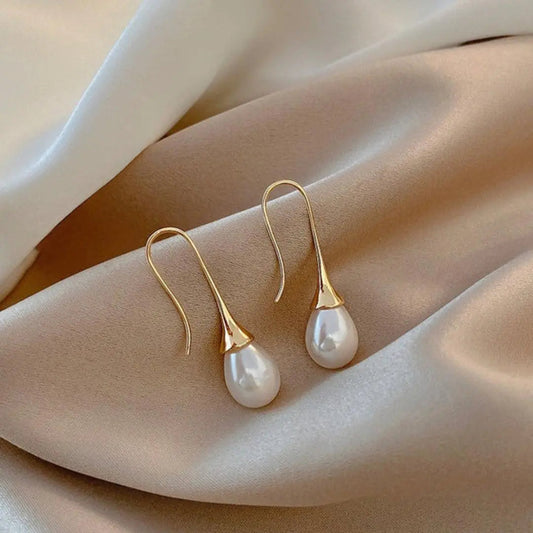 Gold pearl drop earrings