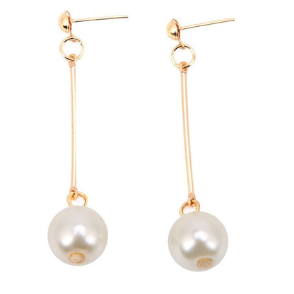 Gold long pearl drop earrings