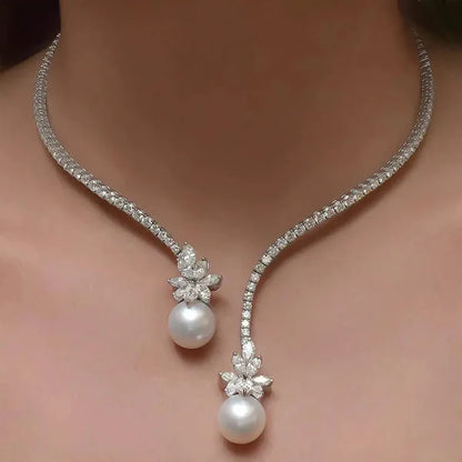 1+1 Offer: Elegant shiny necklace with pearls made of silver + Emerald Cut White Sapphire Bracelet