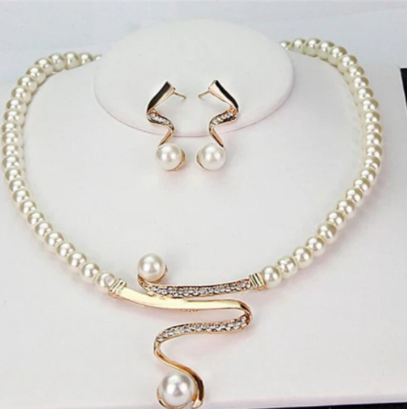 Natural pearl necklace + earring set