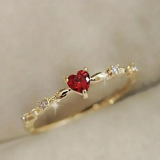 Gold ruby heart ring