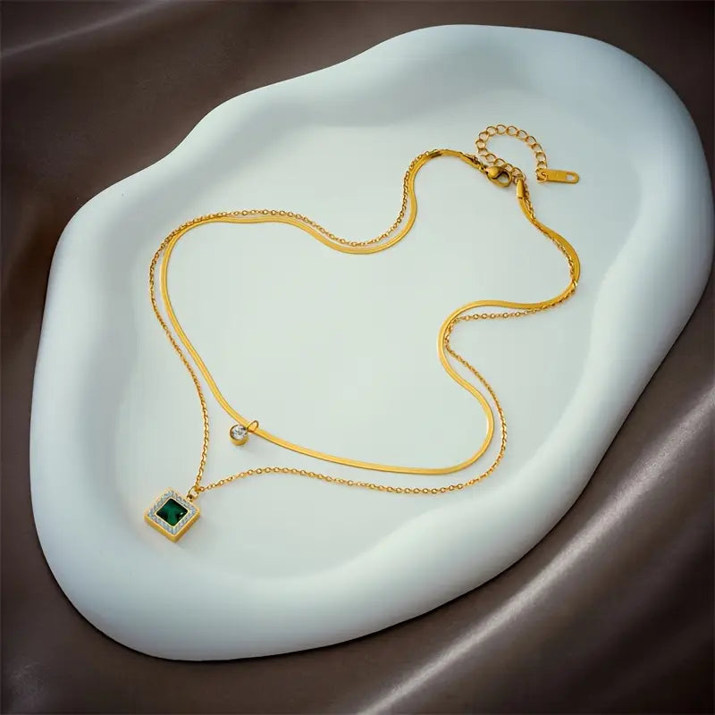 Gold emerald layered necklace
