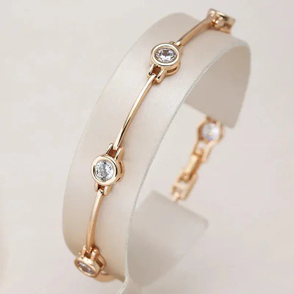 1+1 Offer: Elegant Gold and Crystal Earrings + Elegant bracelet with zirconias in gold